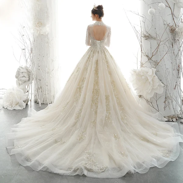 Viktorianischer Stil Champagner Durchsichtige Brautkleider / Hochzeitskleider 2020 Ballkleid Stehkragen Geschwollenes Lange Ärmel Rückenfreies Applikationen Spitze Pailletten Handgefertigt Perlenstickerei Perle Kapelle-Schleppe Rüschen