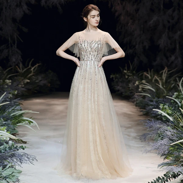 Haut de Gamme Champagne Transparentes Robe De Soirée 2020 Princesse Encolure Dégagée Manches Courtes Perlage Paillettes Longue Volants Robe De Ceremonie