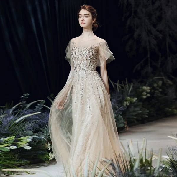 Haut de Gamme Champagne Transparentes Robe De Soirée 2020 Princesse Encolure Dégagée Manches Courtes Perlage Paillettes Longue Volants Robe De Ceremonie