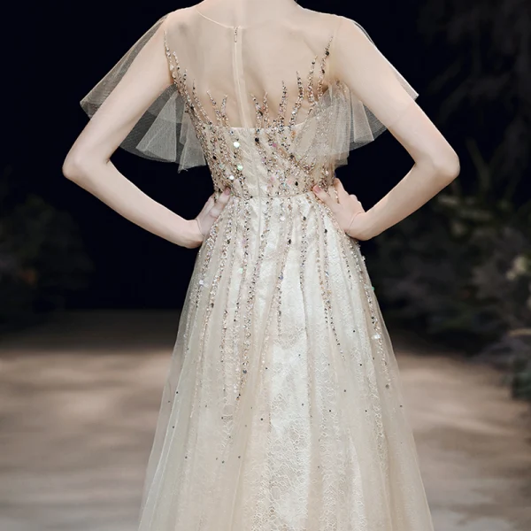 Haut de Gamme Champagne Transparentes Robe De Soirée 2020 Princesse Encolure Dégagée Manches Courtes Perlage Paillettes Longue Volants Robe De Ceremonie