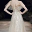 Haut de Gamme Champagne Transparentes Robe De Soirée 2020 Princesse Encolure Dégagée Manches Courtes Perlage Paillettes Longue Volants Robe De Ceremonie