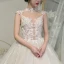 Illusion Champagne See-through Bridal Wedding Dresses 2020 Ball Gown High Neck Sleeveless Appliques Lace Beading Cathedral Train