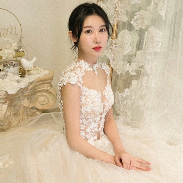 Illusion Champagne See-through Bridal Wedding Dresses 2020 Ball Gown High Neck Sleeveless Appliques Lace Beading Cathedral Train