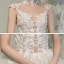 Illusion Champagne See-through Bridal Wedding Dresses 2020 Ball Gown High Neck Sleeveless Appliques Lace Beading Cathedral Train