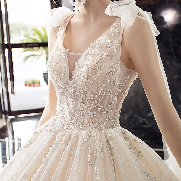 Luxe Champagne La Mariée Robe De Mariée 2020 Robe Boule Transparentes V-Cou Sans Manches Dos Nu Appliques En Dentelle Paillettes Perlage Glitter Tulle Royal Train Volants