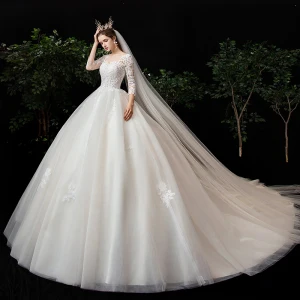 Romantisk Champagne Genomskinliga Brud Bröllopsklänningar 2020 Balklänning Urringning 3 4 Ärm Halterneck Pierced Appliqués Spets Chapel Train