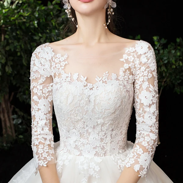 Romantic Champagne See-through Bridal Wedding Dresses 2020 Ball Gown Scoop Neck 3/4 Sleeve Backless Pierced Appliques Lace Chapel Train