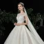 Meilleur Champagne Dentelle La Mariée Robe De Mariée 2020 Robe Boule Transparentes Encolure Carrée Sans Manches Dos Nu Appliques En Dentelle Perlage Cathedral Train Volants