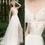 Blanche Jardin / Extérieur Légère Robe De Mariée 2020 Princesse Bretelles Spaghetti Sans Manches Dos Nu Tachetée Tulle Appliques En Dentelle Fendue devant Train De Balayage Volants