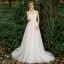 Illusion Champagne Jardin / Extérieur Transparentes Robe De Mariée 2020 Princesse Encolure Dégagée Sans Manches Ceinture Dos Nu Appliques En Dentelle Perlage Train De Balayage Volants