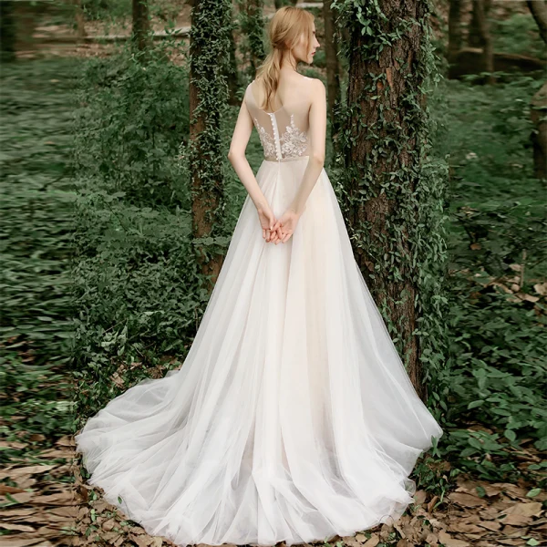 Illusion Champagne Jardin / Extérieur Transparentes Robe De Mariée 2020 Princesse Encolure Dégagée Sans Manches Ceinture Dos Nu Appliques En Dentelle Perlage Train De Balayage Volants