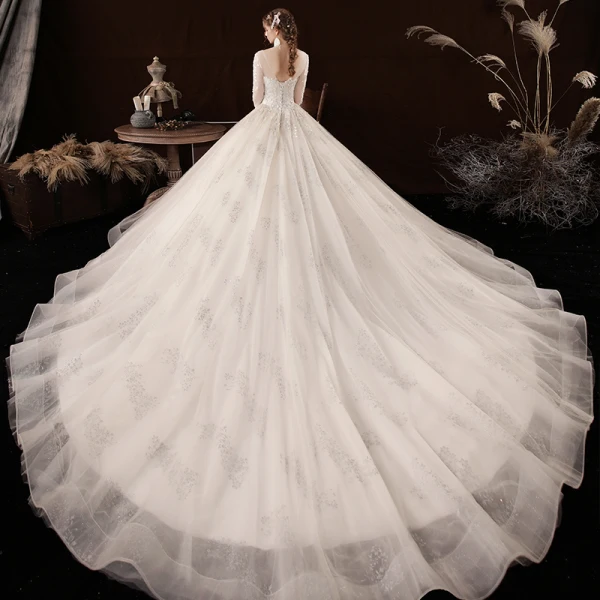 Schöne Champagner Hochzeits Brautkleider / Hochzeitskleider 2020 Ballkleid Durchsichtige V-Ausschnitt 3/4 Ärmel Rückenfreies Applikationen Spitze Perlenstickerei Kathedrale Schleppe Rüschen
