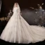 Schöne Champagner Hochzeits Brautkleider / Hochzeitskleider 2020 Ballkleid Durchsichtige V-Ausschnitt 3/4 Ärmel Rückenfreies Applikationen Spitze Perlenstickerei Kathedrale Schleppe Rüschen