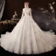 Schöne Champagner Hochzeits Brautkleider / Hochzeitskleider 2020 Ballkleid Durchsichtige V-Ausschnitt 3/4 Ärmel Rückenfreies Applikationen Spitze Perlenstickerei Kathedrale Schleppe Rüschen