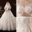 Schöne Champagner Hochzeits Brautkleider / Hochzeitskleider 2020 Ballkleid Durchsichtige V-Ausschnitt 3/4 Ärmel Rückenfreies Applikationen Spitze Perlenstickerei Kathedrale Schleppe Rüschen