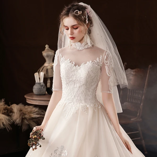 Vintage / Retro Champagne Bridal Wedding Dresses 2020 Ball Gown See-through High Neck 1/2 Sleeves Backless Beading Appliques Lace Sequins Cathedral Train Ruffle