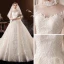 Vintage / Retro Champagne Bridal Wedding Dresses 2020 Ball Gown See-through High Neck 1/2 Sleeves Backless Beading Appliques Lace Sequins Cathedral Train Ruffle