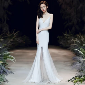Sexy White Evening Dresses 2020 Trumpet Mermaid Spaghetti Straps Sleeveless Sequins Sweep Train Ruffle Backless Formal Dresses