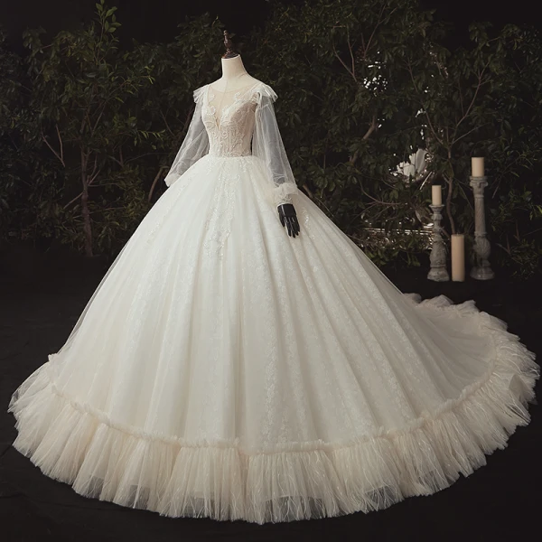 Luxe Ivoire La Mariée Robe De Mariée 2020 Robe Boule Transparentes Col v profond Gonflée Manches Longues Dos Nu Appliques En Dentelle Paillettes Perlage Cathedral Train Volants