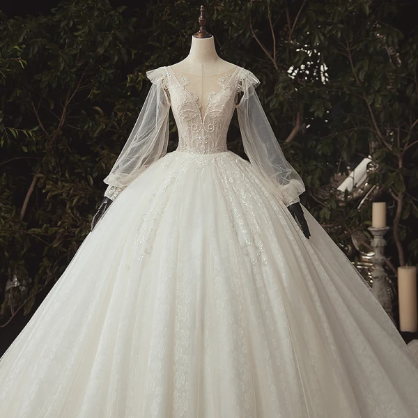 Luxe Ivoire La Mariée Robe De Mariée 2020 Robe Boule Transparentes Col v profond Gonflée Manches Longues Dos Nu Appliques En Dentelle Paillettes Perlage Cathedral Train Volants