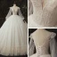 Luxe Ivoire La Mariée Robe De Mariée 2020 Robe Boule Transparentes Col v profond Gonflée Manches Longues Dos Nu Appliques En Dentelle Paillettes Perlage Cathedral Train Volants