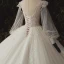Luxe Ivoire La Mariée Robe De Mariée 2020 Robe Boule Transparentes Col v profond Gonflée Manches Longues Dos Nu Appliques En Dentelle Paillettes Perlage Cathedral Train Volants