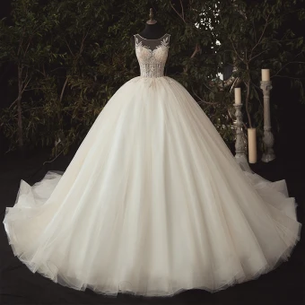 Illusion Ivory Bridal Wedding Dresses 2020 Ball Gown See Through Scoop Neck Sleeveless Backless Appliques Sequins Beading Cathedral Train Ruffle