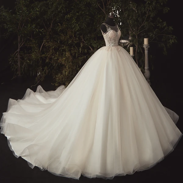 Illusion Ivoire La Mariée Robe De Mariée 2020 Robe Boule Transparentes Encolure Dégagée Sans Manches Dos Nu Appliques Paillettes Perlage Cathedral Train Volants
