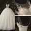 Illusion Ivoire La Mariée Robe De Mariée 2020 Robe Boule Transparentes Encolure Dégagée Sans Manches Dos Nu Appliques Paillettes Perlage Cathedral Train Volants