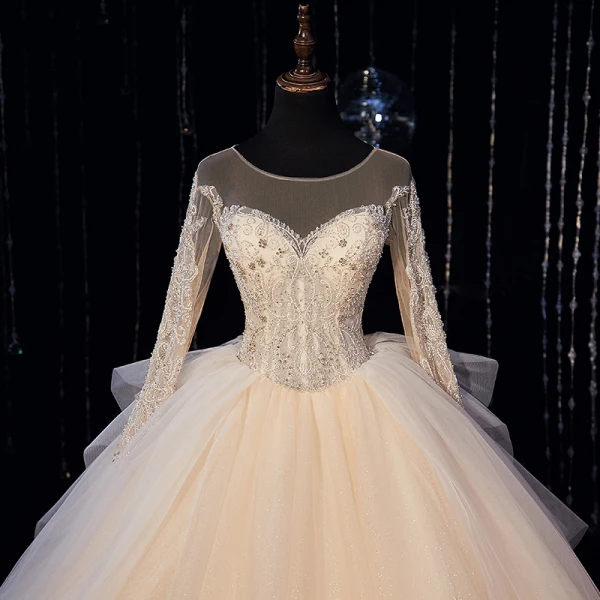 Luxury / Gorgeous Champagne Bridal Wedding Dresses 2020 Ball Gown See-through Scoop Neck Long Sleeve Backless Beading Glitter Tulle Cathedral Train Ruffle
