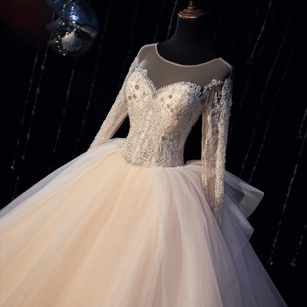 Luxury / Gorgeous Champagne Bridal Wedding Dresses 2020 Ball Gown See-through Scoop Neck Long Sleeve Backless Beading Glitter Tulle Cathedral Train Ruffle