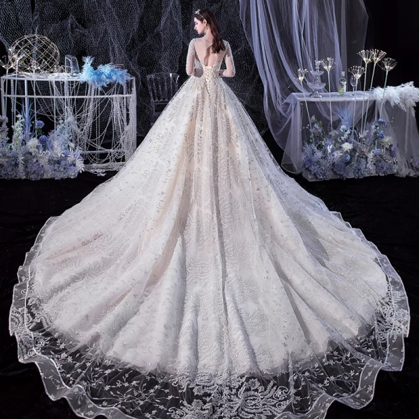 Meilleur Champagne La Mariée Robe De Mariée 2020 Robe Boule Transparentes Encolure Carrée Manches Longues Dos Nu Appliques En Dentelle Perlage Glitter Tulle Cathedral Train Volants