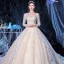 Meilleur Champagne La Mariée Robe De Mariée 2020 Robe Boule Transparentes Encolure Carrée Manches Longues Dos Nu Appliques En Dentelle Perlage Glitter Tulle Cathedral Train Volants