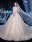 Meilleur Champagne La Mariée Robe De Mariée 2020 Robe Boule Transparentes Encolure Carrée Manches Longues Dos Nu Appliques En Dentelle Perlage Glitter Tulle Cathedral Train Volants