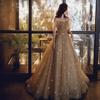 Élégant Doré Robe De Soirée 2020 Princesse Transparentes Encolure Dégagée Manches Courtes Perlage Glitter Tulle Train De Balayage Volants Dos Nu Robe De Ceremonie