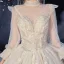 Style Victorien Champagne La Mariée Robe De Mariée 2020 Robe Boule Transparentes Col Haut Gonflée Manches Longues Dos Nu Appliques Fleur Paillettes Perlage Glitter Tulle Cathedral Train Volants
