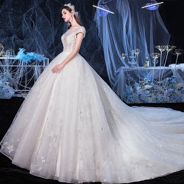Illusion Ivory See-through Bridal Wedding Dresses 2020 Ball Gown Scoop Neck Short Sleeve Backless Appliques Flower Beading Cathedral Train