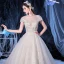 Illusion Ivory See-through Bridal Wedding Dresses 2020 Ball Gown Scoop Neck Short Sleeve Backless Appliques Flower Beading Cathedral Train