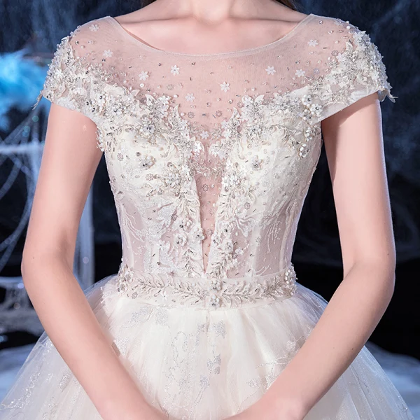 Illusion Ivory See-through Bridal Wedding Dresses 2020 Ball Gown Scoop Neck Short Sleeve Backless Appliques Flower Beading Cathedral Train