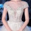 Illusion Ivory See-through Bridal Wedding Dresses 2020 Ball Gown Scoop Neck Short Sleeve Backless Appliques Flower Beading Cathedral Train