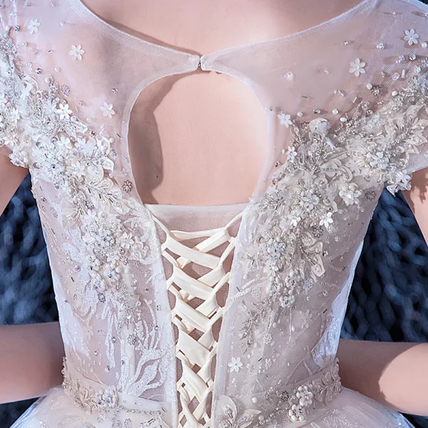 Illusion Ivory See-through Bridal Wedding Dresses 2020 Ball Gown Scoop Neck Short Sleeve Backless Appliques Flower Beading Cathedral Train