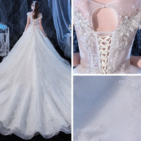 Illusion Ivory See-through Bridal Wedding Dresses 2020 Ball Gown Scoop Neck Short Sleeve Backless Appliques Flower Beading Cathedral Train