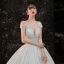 Illusion Ivoire Satin La Mariée Robe De Mariée 2020 Robe Boule Transparentes Encolure Dégagée Manches Courtes Dos Nu Appliques En Dentelle Perlage Cathedral Train