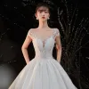 Illusion Ivory Satin Bridal Wedding Dresses 2020 Ball Gown See-through Scoop Neck Short Sleeve Backless Appliques Lace Beading Cathedral Train