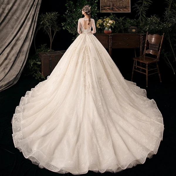 Chic / Beautiful Champagne See-through Bridal Wedding Dresses 2020 Ball Gown Scoop Neck Long Sleeve Backless Appliques Flower Beading Sequins Cathedral Train Ruffle