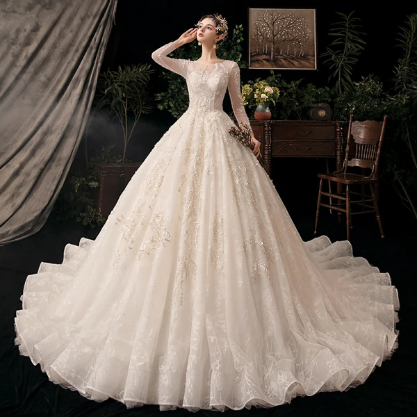 Chic / Beautiful Champagne See-through Bridal Wedding Dresses 2020 Ball Gown Scoop Neck Long Sleeve Backless Appliques Flower Beading Sequins Cathedral Train Ruffle