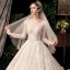 Chic / Beautiful Champagne See-through Bridal Wedding Dresses 2020 Ball Gown Scoop Neck Long Sleeve Backless Appliques Flower Beading Sequins Cathedral Train Ruffle