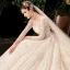 Chic / Beautiful Champagne See-through Bridal Wedding Dresses 2020 Ball Gown Scoop Neck Long Sleeve Backless Appliques Flower Beading Sequins Cathedral Train Ruffle