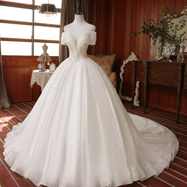 Best White Bridal Wedding Dresses 2020 Ball Gown Off-The-Shoulder Short Sleeve Backless Beading Tassel Glitter Tulle Chapel Train Ruffle