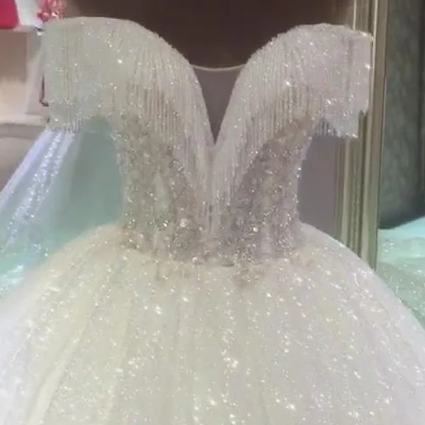 Best White Bridal Wedding Dresses 2020 Ball Gown Off-The-Shoulder Short Sleeve Backless Beading Tassel Glitter Tulle Chapel Train Ruffle